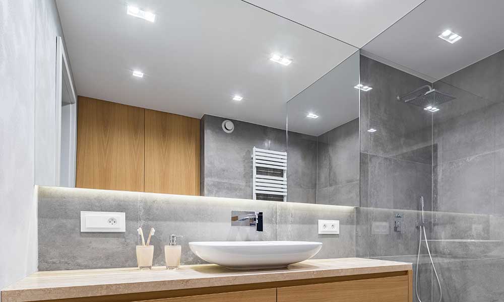 Use Clips Or A Track To Hold Mirror, Bathroom Frameless Mirror Installation
