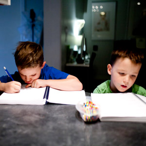 two children studying