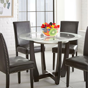 Glass table top with a bowl of fruit centerpiece 