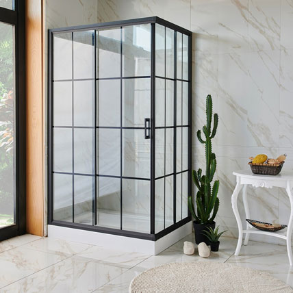 Crittall style glass showers are competing with the popular frameless units. These also feature clear glass, but it is contrasted with black metal framing and mullions.