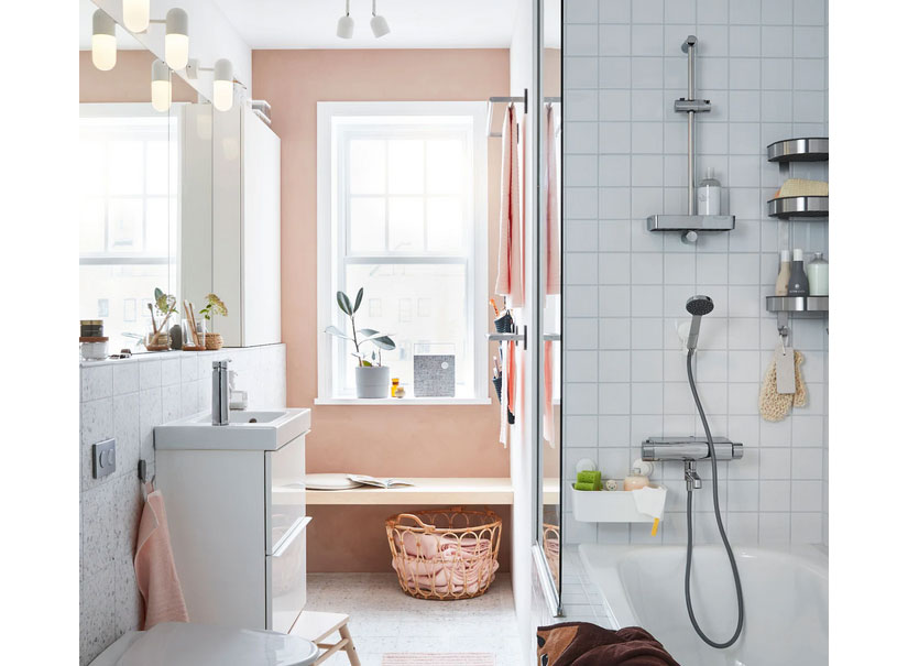 Bathroom with pink accent wall and shower screen