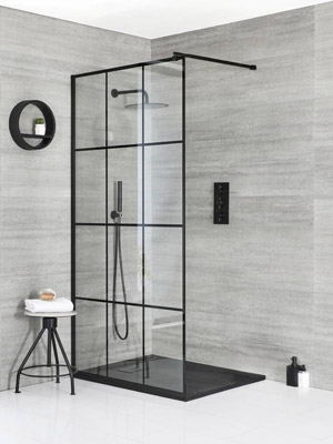 A walk-in shower has no swinging or rolling door panel. Instead, the entrance is left completely open.