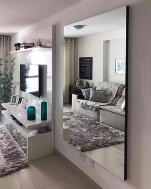 Add an accent mirror to your room to maximize natural lighting