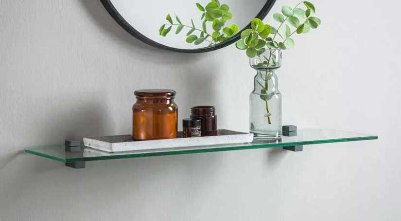 There are actually a few different approaches you can take to keep the vignettes on your glass shelves fresh and on-trend.