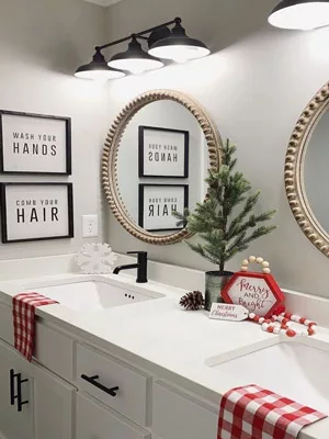 Bring in items from nature or holiday themed pieces to give your bathroom winter flair.