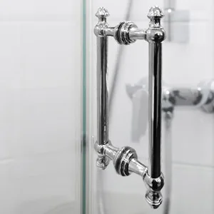 
While glass tends to be the most prominent element on a shower enclosure, the hardware has lots of power to create a bespoke-style glass shower.