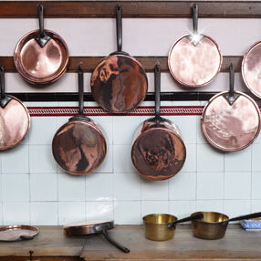 Use more than one metallic tone in your kitchen by purchasing some antique copperware, swapping out the door knobs and drawer pulls, or bringing in a new finish on lights or other installations.