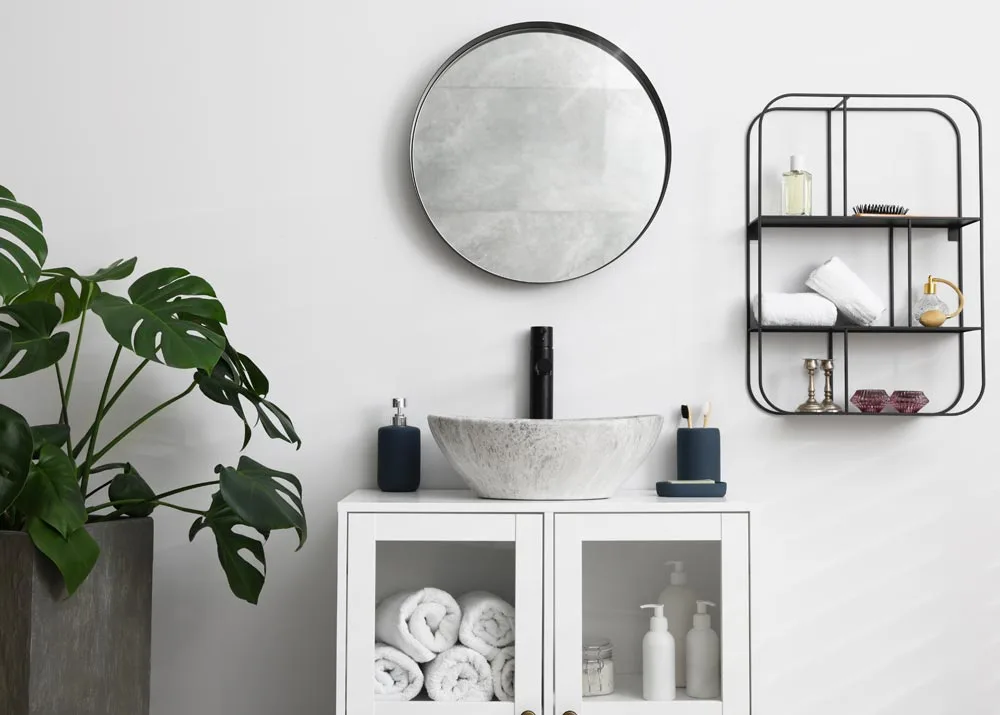 Glass can certainly be used to spruce up a bathroom vanity. 