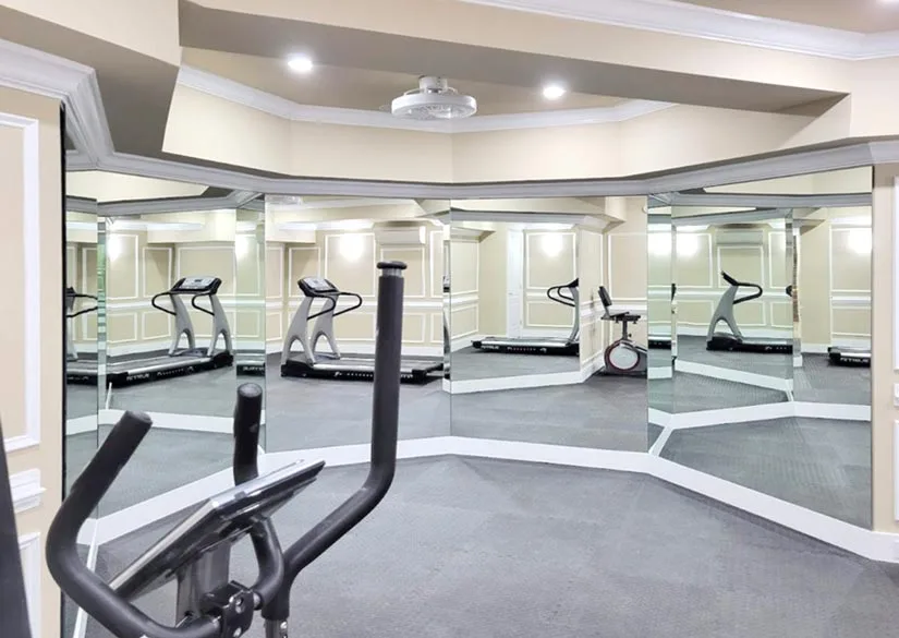 Contact a custom glass shop like ABC Glass & Mirror of Manassas Park to have custom gym mirrors installed in your home.