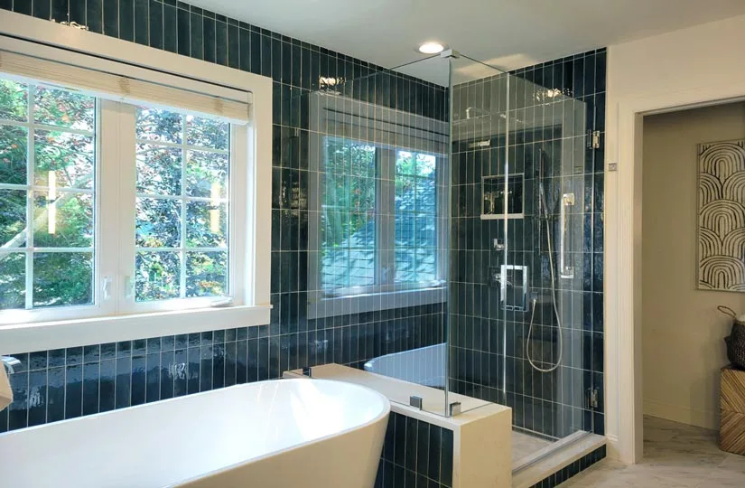 One of the best ways to improve a bathroom is by replacing the shower curtain or old framed doors with a frameless glass shower enclosure.