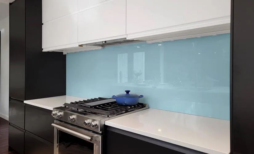 Back painted glass is an appealing alternative to surface coverings that are difficult to clean and keep fresh. 