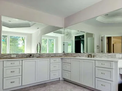 Extra large vanity mirrors in a large bathroom